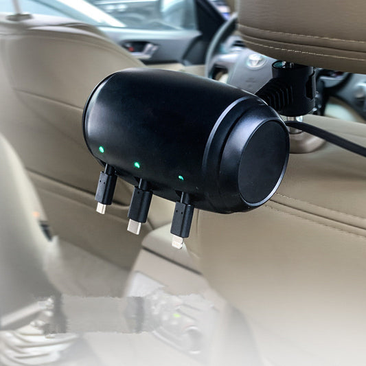 Car dashboard with a multi-port USB car charger attached